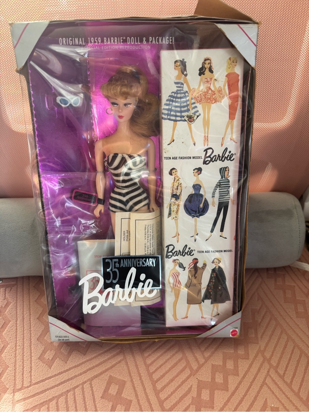 Barbie Black & White Striped Swimsuit Doll with Pink Packaging (Barbie)